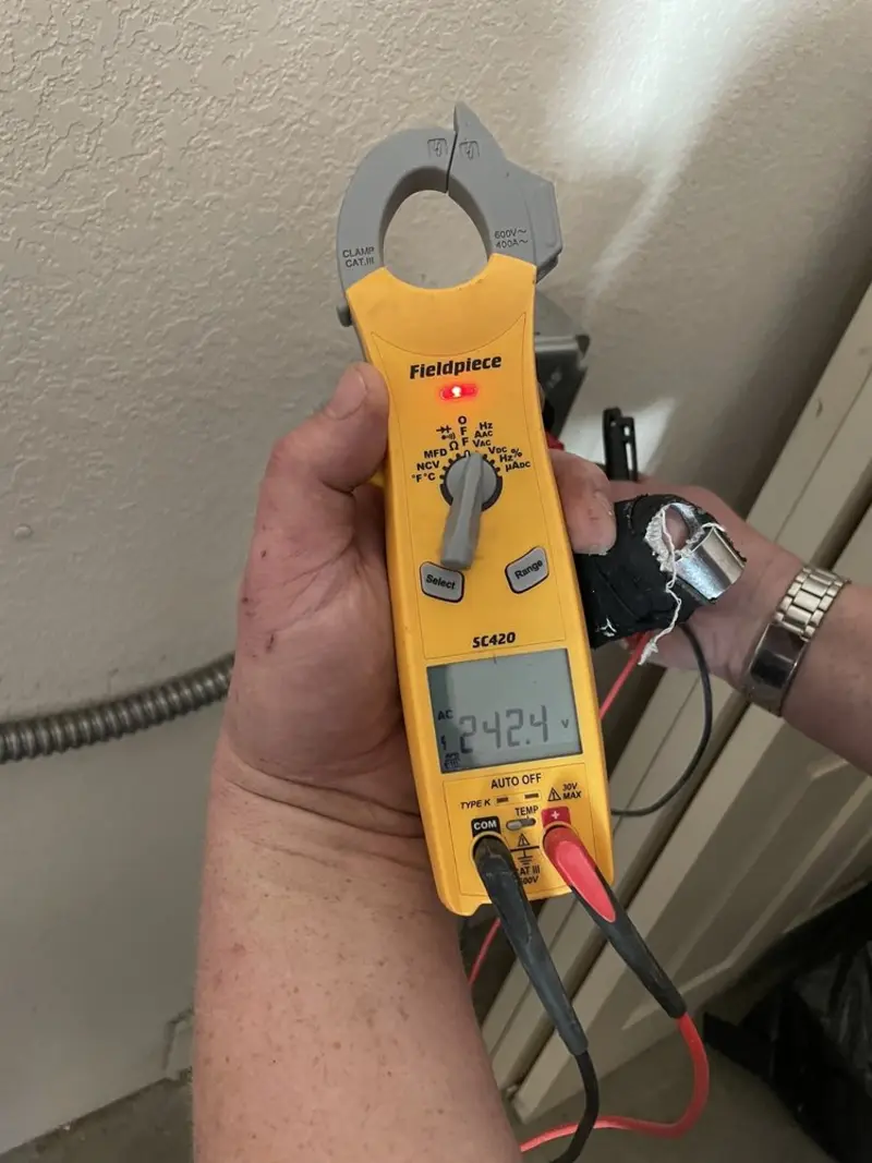 Voltage testing with clamp meter during Circuit Breaker Repair in Church Hill